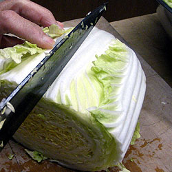 Chop The Bottom Part Of The Chinese Cabbage Into Two (22k)