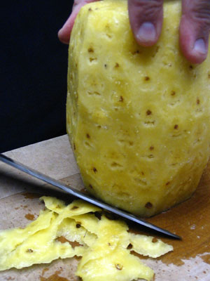 Touch Up The Sides By Slicing Off The Tough Spots. Look For Darker Yellow Color Spots. (28k)