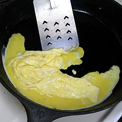 Another Picture Cooking Scrambled Eggs (18k)