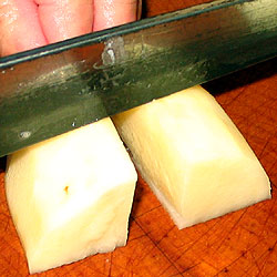 Cut The Two Halves Or Two 1/8ths Of The Potato Into 1 to 1 1/2 inch cubes (20k)