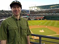 Oakland Coliseum Baseball Game Wearing An Oakland A's Cap